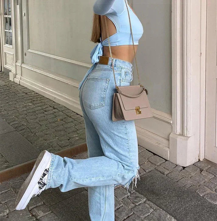 Jeans déchirés femme – Pantalon tendance à coupe ajustée et style moderne